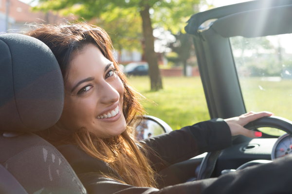 Business woman in sports car